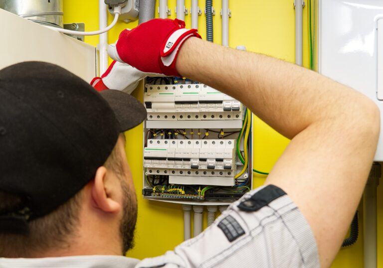 The dielectric in the electrical panel checks the build quality. inspection of connections in the electrical panel. electric panel in a private house. home repairs service concept