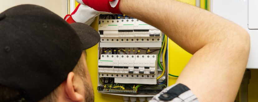 The dielectric in the electrical panel checks the build quality. inspection of connections in the electrical panel. electric panel in a private house. home repairs service concept